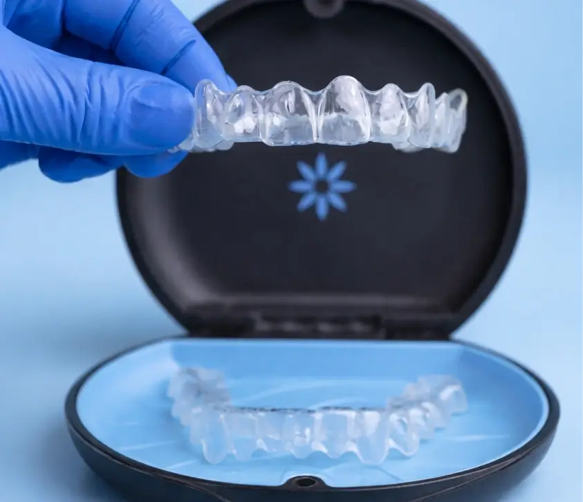 Invisalign clear aligners in a case at Dental Elements in Shawnee, Leawood and Wellsville, KS